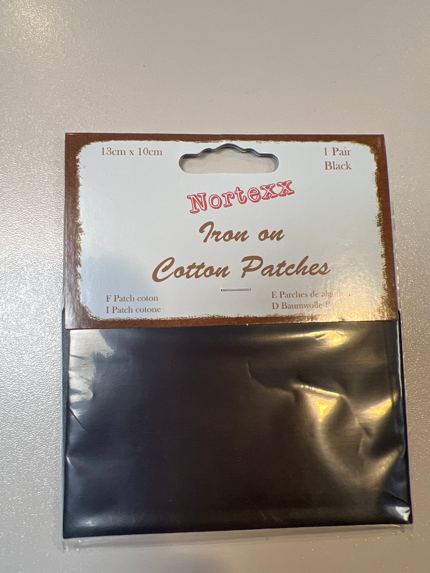 Black iron on patches