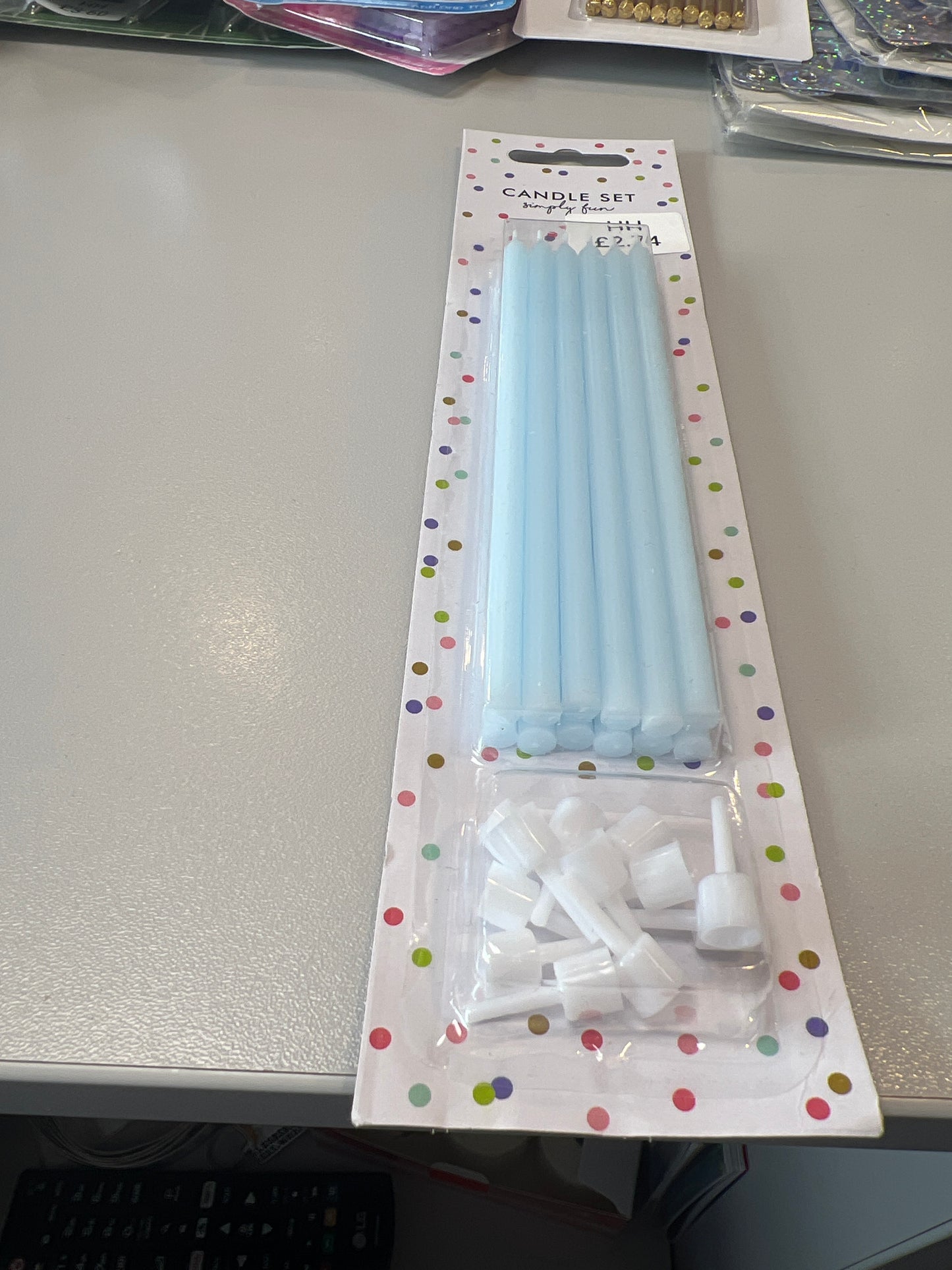 Pale blue cake candles. 14cm