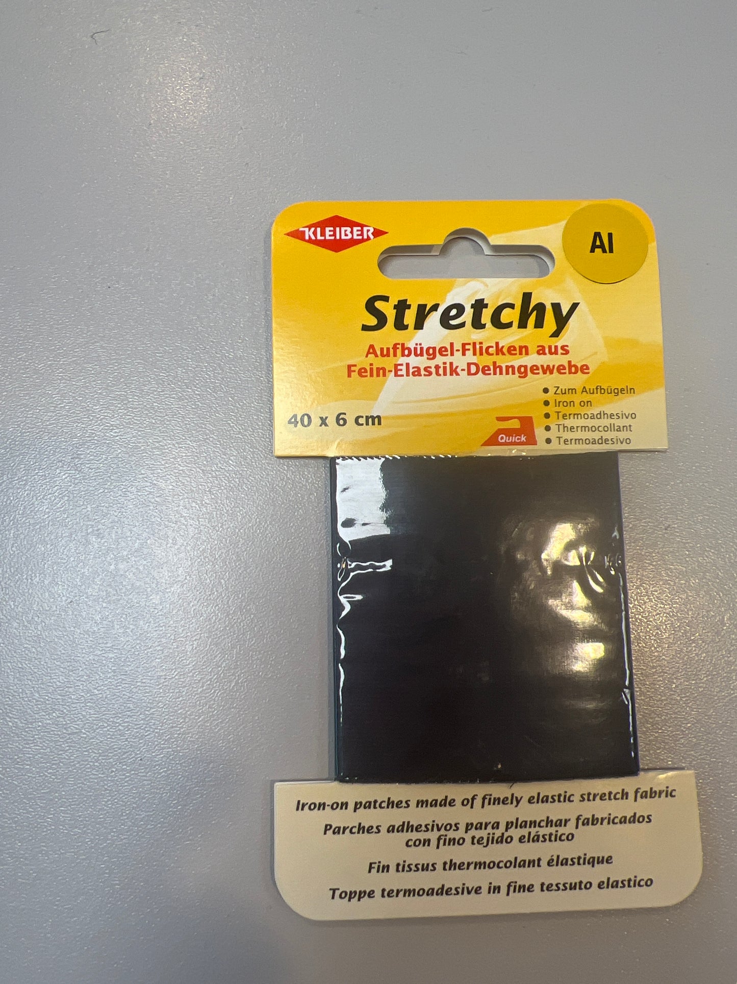 Kleiber Stretchy Iron on Patch.  Navy Blue
