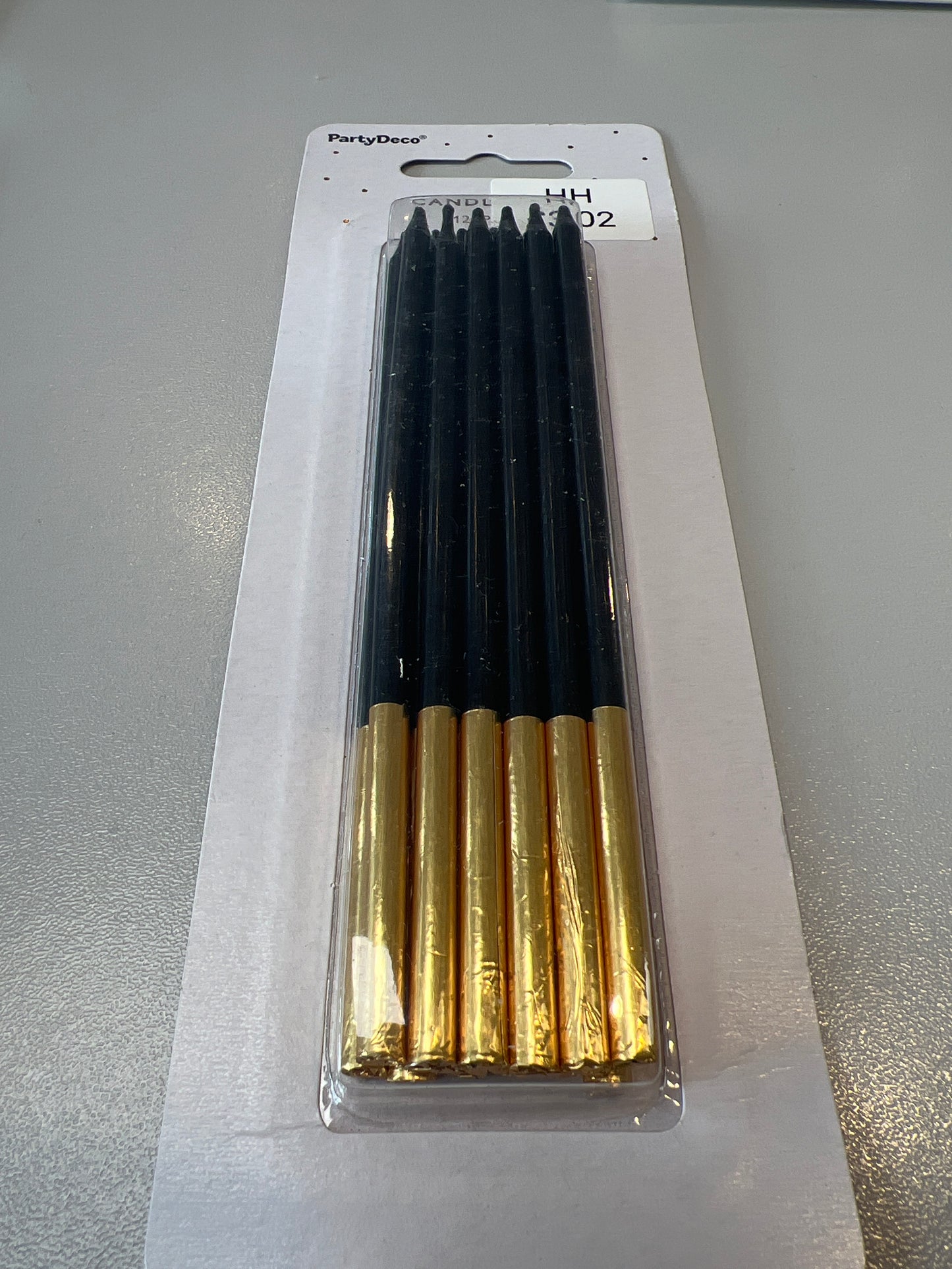 Black and gold cake candles