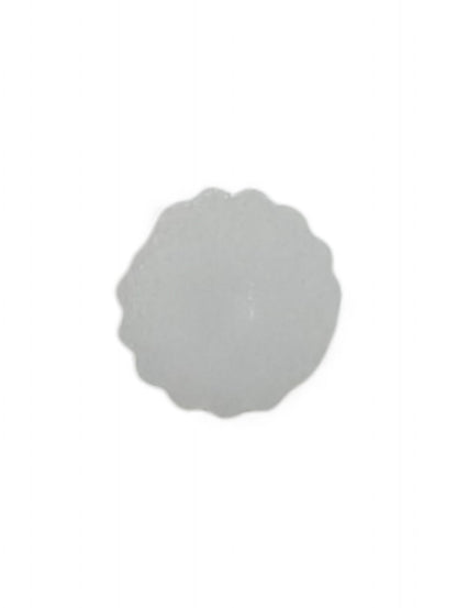 Craft button for sewing in white - close up detail