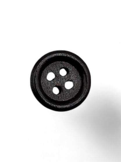 Craft button for sewing in brown - texture detail